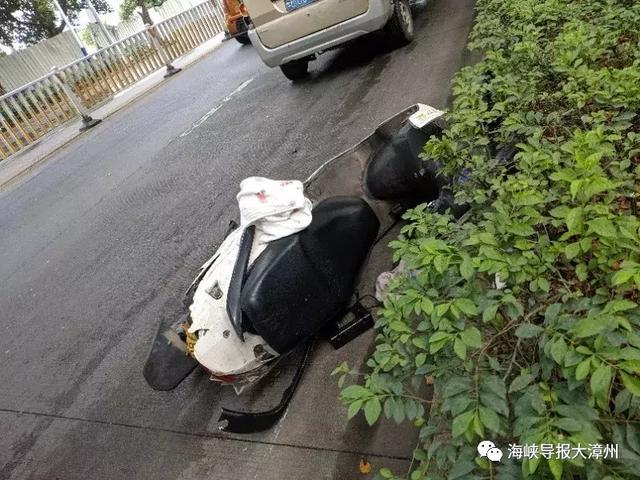 今早，市区金峰南路一辆摩托车与面包车相撞，一婴儿也被撞-1.jpg